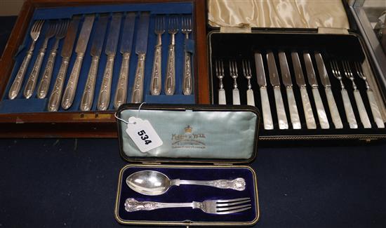 Four various cased plated sets of cutlery and a cased Christening pair.